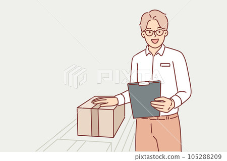 Man warehouse worker stands near conveyor with boxes and holds clipboard checking data on parcels 105288209