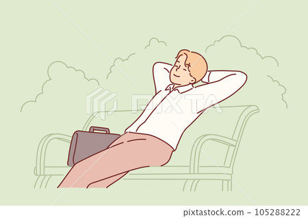 Happy businessman sits on park bench with eyes closed and enjoys outdoor recreation 105288222