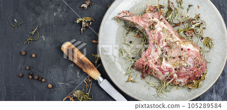 Raw fresh steak Tomahawk, space for text. 105289584