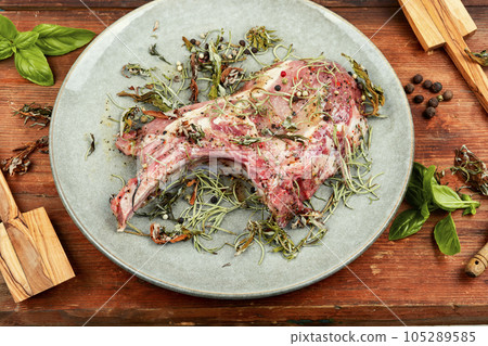 Raw barbecue Tomahawk steak 105289585