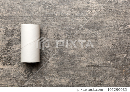 Flat lay composition with empty toilet paper rolls and space for text on color background. Recyclable paper tube with metal plug end made of kraft paper or cardboard 105290083