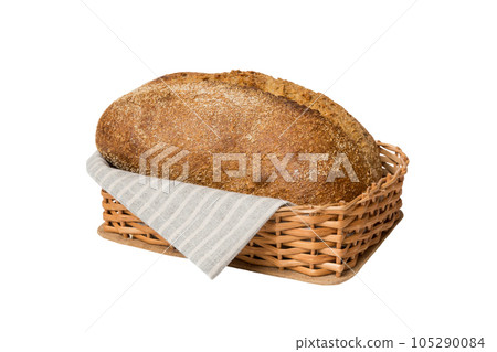 Freshly baked bread on basket isolated on white background. Perspective view bread copy space Freshly baked bread on basket isolated on white background. Perspective view bread copy space 105290084