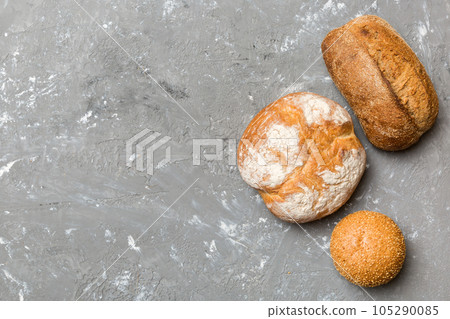 Homemade natural breads. Different kinds of fresh bread as background, top view with copy space 105290085