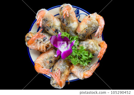 Traditional fried vietnamese spring rolls with shrimps and pork, rice paper on black background 105290452
