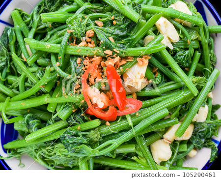 Vietnamese stir fried morning glory with garlic  105290461