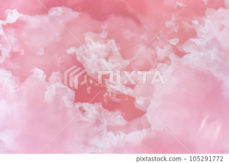 Light pink blurred background made of pink jade or Nephrite 105291772
