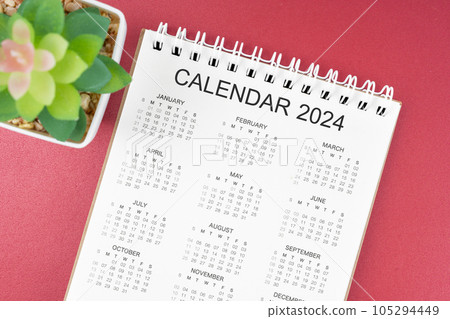 The 12 months desk calendar 2024 on red background. 105294449