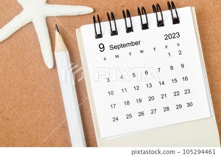 The September 2023 Monthly calendar with Starfish and pencil on wooden background. The September 2023 Monthly calendar with Starfish and pencil on wooden background. 105294461