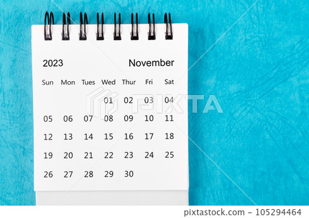 The November 2023 Monthly desk calendar for 2023 year on blue background. The November 2023 Monthly desk calendar for 2023 year on blue background. 105294464