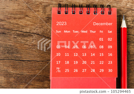 The Red December 2023 Monthly desk calendar for 2023 year with pencil on wooden background. The Red December 2023 Monthly desk calendar for 2023 year with pencil on wooden background. 105294465
