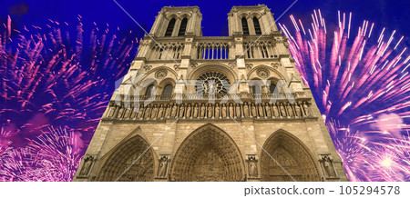 Celebratory fireworks over the Notre Dame de Paris, also known as Notre Dame Cathedral or simply Notre Dame, is a Gothic, Roman Catholic cathedral of Paris, France 105294578