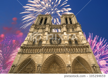 Celebratory fireworks over the Notre Dame de Paris, also known as Notre Dame Cathedral or simply Notre Dame, is a Gothic, Roman Catholic cathedral of Paris, France 105294659