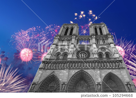 Celebratory fireworks over the Notre Dame de Paris, also known as Notre Dame Cathedral or simply Notre Dame, is a Gothic, Roman Catholic cathedral of Paris, France Celebratory fireworks over the Notre Dame de Paris, also known as Notre Dame Cathedral or simply Notre Dame, is a Gothic, Roman Catholic cathedral of Paris, France 105294668