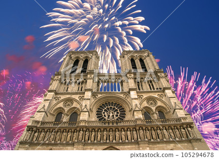 Celebratory fireworks over the Notre Dame de Paris, also known as Notre Dame Cathedral or simply Notre Dame, is a Gothic, Roman Catholic cathedral of Paris, France Celebratory fireworks over the Notre Dame de Paris, also known as Notre Dame Cathedral or simply Notre Dame, is a Gothic, Roman Catholic cathedral of Paris, France 105294678