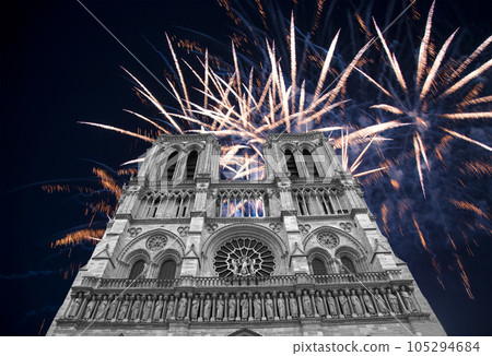 Celebratory fireworks over the Notre Dame de Paris, also known as Notre Dame Cathedral or simply Notre Dame, is a Gothic, Roman Catholic cathedral of Paris, France Celebratory fireworks over the Notre Dame de Paris, also known as Notre Dame Cathedral or simply Notre Dame, is a Gothic, Roman Catholic cathedral of Paris, France 105294684