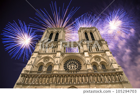 Celebratory fireworks over the Notre Dame de Paris, also known as Notre Dame Cathedral or simply Notre Dame, is a Gothic, Roman Catholic cathedral of Paris, France 105294703