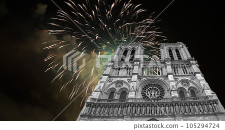 Celebratory fireworks over the Notre Dame de Paris, also known as Notre Dame Cathedral or simply Notre Dame, is a Gothic, Roman Catholic cathedral of Paris, France 105294724