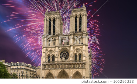 Celebratory fireworks over the Notre Dame de Paris, also known as Notre Dame Cathedral or simply Notre Dame, is a Gothic, Roman Catholic cathedral of Paris, France 105295338