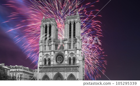 Celebratory fireworks over the Notre Dame de Paris, also known as Notre Dame Cathedral or simply Notre Dame, is a Gothic, Roman Catholic cathedral of Paris, France 105295339