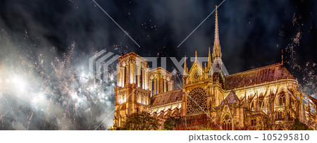 Celebratory fireworks over the Notre Dame de Paris, also known as Notre Dame Cathedral or simply Notre Dame, is a Gothic, Roman Catholic cathedral of Paris, France 105295810