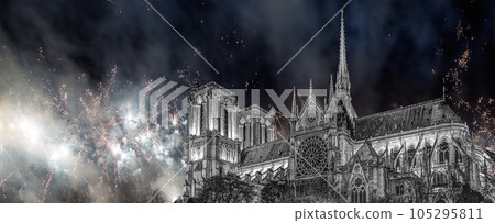 Celebratory fireworks over the Notre Dame de Paris, also known as Notre Dame Cathedral or simply Notre Dame, is a Gothic, Roman Catholic cathedral of Paris, France 105295811