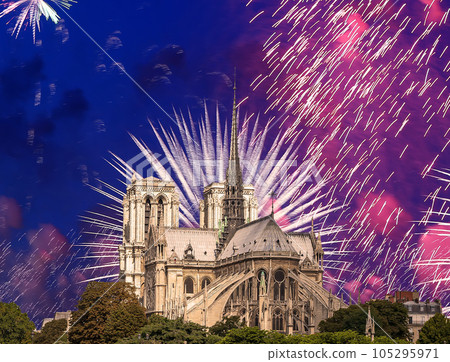 Celebratory fireworks over the Notre Dame de Paris, also known as Notre Dame Cathedral or simply Notre Dame, is a Gothic, Roman Catholic cathedral of Paris, France Celebratory fireworks over the Notre Dame de Paris, also known as Notre Dame Cathedral or simply Notre Dame, is a Gothic, Roman Catholic cathedral of Paris, France 105295971