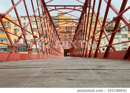 Bridge in Girona, Catalonia, Spain: Eiffel Bridge constructed by Gustave Eiffel over the Onyar River in Girona, Catalonia, Spain. 105296692
