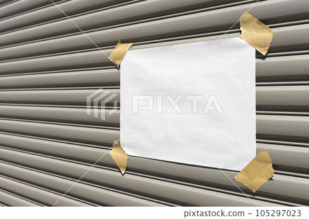 A blank sticker pasted on the shutter of a private house 105297023