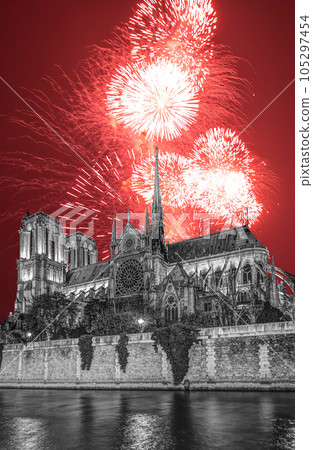 Celebratory fireworks over the Notre Dame de Paris, also known as Notre Dame Cathedral or simply Notre Dame, is a Gothic, Roman Catholic cathedral of Paris, France 105297454