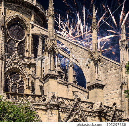 Celebratory fireworks over the Notre Dame de Paris, also known as Notre Dame Cathedral or simply Notre Dame, is a Gothic, Roman Catholic cathedral of Paris, France 105297886