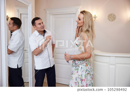 woman talking with doctor about face aesthetic treatment woman talking with doctor about face aesthetic treatment 105298492