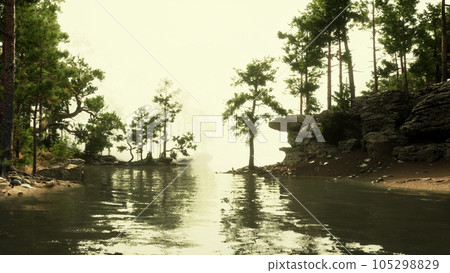 idyllic mountain paradise, with a sparkling lake and verdant foliage 105298829