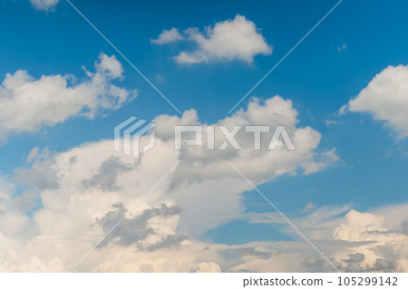White clouds against blue sky 105299142