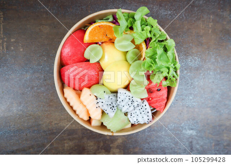 fruit and vegetable salad or apple, dragon fruit and lettuce salad fruit and vegetable salad or apple, dragon fruit and lettuce salad 105299428