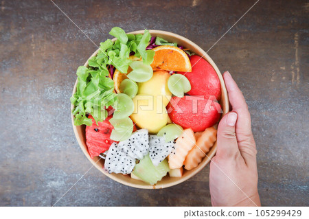 fruit and vegetable salad or apple, dragon fruit and lettuce salad fruit and vegetable salad or apple, dragon fruit and lettuce salad 105299429