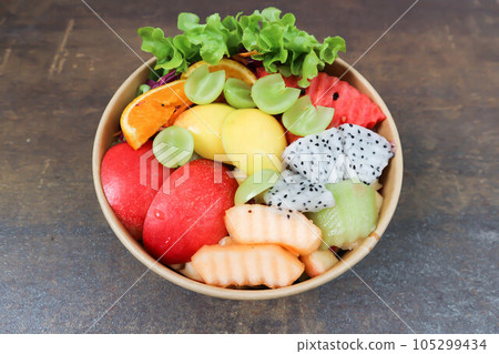 fruit and vegetable salad or apple, dragon fruit and lettuce salad fruit and vegetable salad or apple, dragon fruit and lettuce salad 105299434