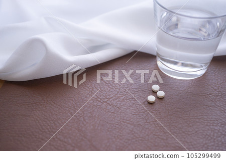 Tablets and water Tablets and water 105299499