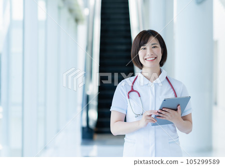 Young female nurse working in a hospital 105299589
