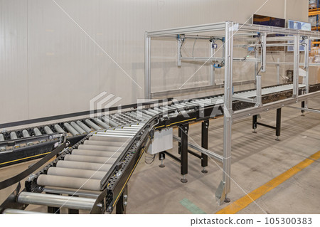 Conveyor in Distribution Warehouse Conveyor in Distribution Warehouse 105300383