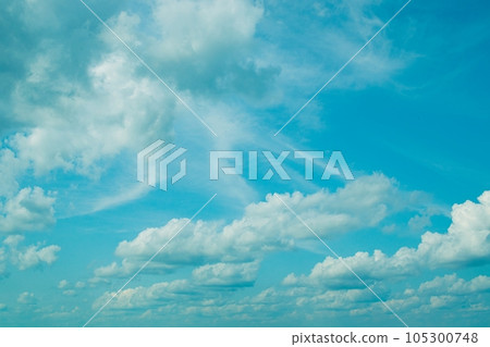 Bright blue sky with cumulus and cirrocumulus clouds, day  105300748