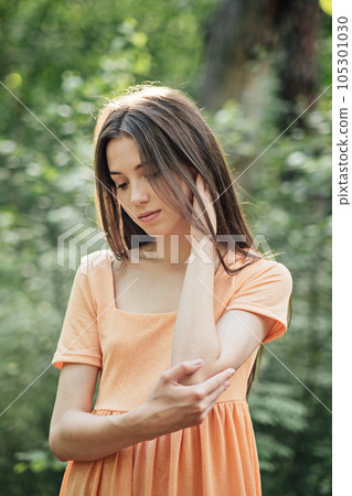 Mental health of adolescents, Teen Mental Health. Psychological support for teens. Outdoor portrait of teenager girl in nature background with reflection. 105301030