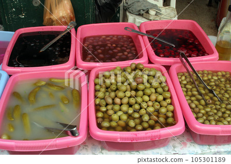 Sale of pickles in the souq of the Muslim Quarter in the Old City of Jerusalem, IL. Sale of pickles in the souq of the Muslim Quarter in the Old City of Jerusalem, IL. 105301189