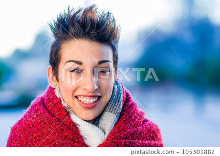 headshot froma a yooung hispanic female. Beautiful woman with an ambiguous hairsyling headshot froma a yooung hispanic female. Beautiful woman with an ambiguous hairsyling 105301882