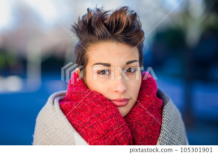 headshot froma a yooung hispanic female. Beautiful woman with an ambiguous hairsyling headshot froma a yooung hispanic female. Beautiful woman with an ambiguous hairsyling 105301901