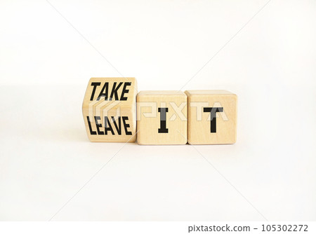 Take or leave it symbol. Businessman turns wooden cubes and changes words Leave it to Take it. Beautiful white table white background. Copy space. Business and take or leave it concept. Take or leave it symbol. Businessman turns wooden cubes and changes words Leave it to Take it. Beautiful white table white background. Copy space. Business and take or leave it concept. 105302272