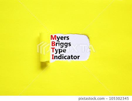 MBTI Myers Briggs type indicator symbol. Concept words MBTI Myers Briggs type indicator on white paper on beautiful yellow background. Psychological MBTI Myers Briggs type indicator concept Copy space 105302345