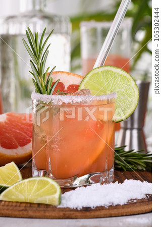 Cocktail Pink Paloma is grapefruit and tequila 105302444