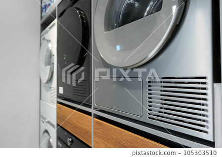 Washing machines and drying machines home appliance retail store showroom Washing machines and drying machines home appliance retail store showroom 105303510