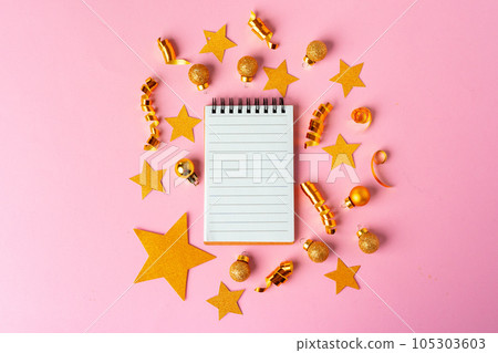 Blank sheet of paper with golden decorative stars. New year resolutions concept 105303603