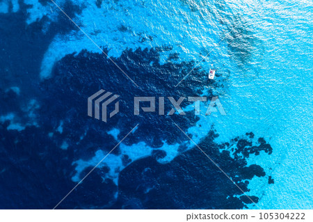 Drone view of a sailing yacht. Luxury transportation. Vacationing people. Vacation and holidays. 105304222